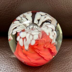 Glass paperweight. Vintage but pristine condition. Artist stamp on the bottom